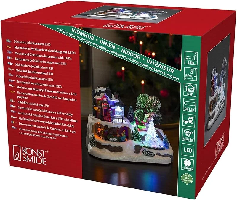 Besuche den Konstsmide-Store Konstsmide LED Szenerie Bahnhof mit Animation und 8 klassischen Weihnachtsliedern, wählbare Energieversorgung, 9 Bunte Dioden, 4.5V Innentrafo, batteriebetrieben, Innen, transparentes Kabel - 3446-000 — Weihnachtsdeko