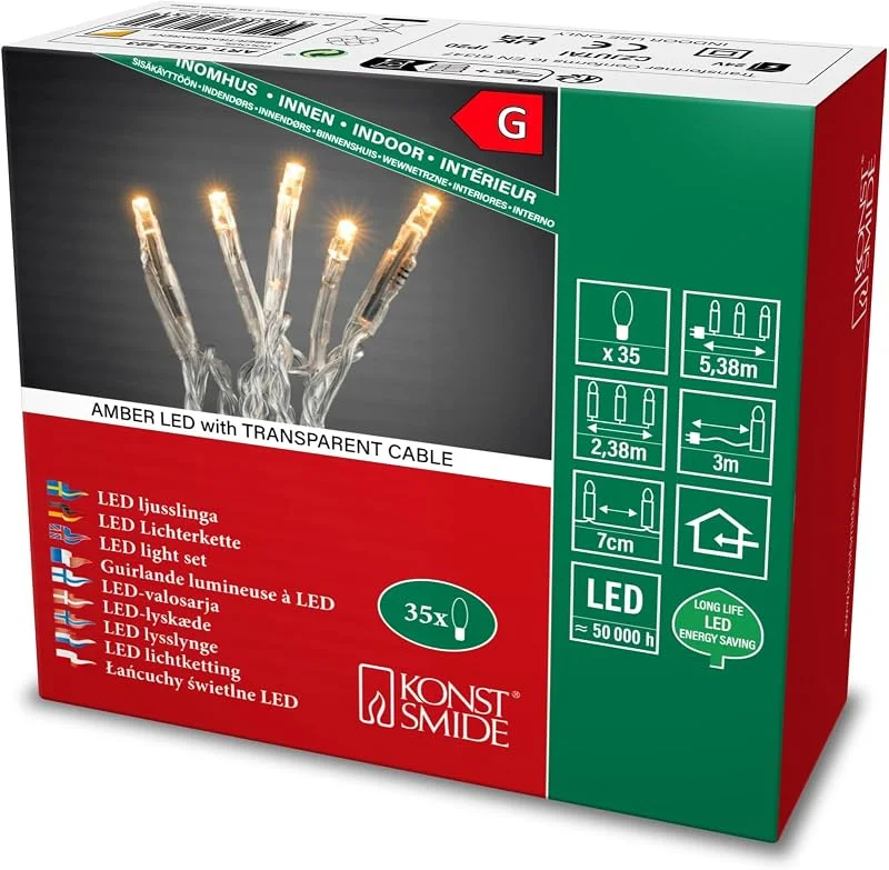 Besuche den Konstsmide-Store Konstsmide 6352-823 Micro-LED-Lichterkette, für den Innenbereich (IP20), VDE-geprüft, interner 24V-Transformator, 35 bernsteinfarbene Dioden, transparentes Kabel [Energieklasse A] — Weihnachtsbeleuchtung