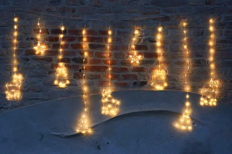 Besuche den Gartenpirat-Store Gartenpirat LED Lichtervorhang Rehe Bäume Glocken & Sterne mit 173 LEDs — Weihnachtsbeleuchtung