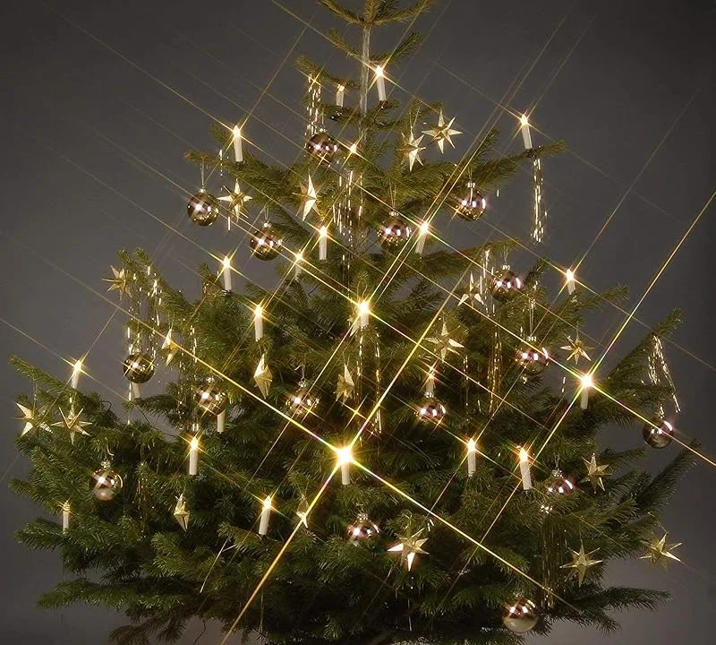 Besuche den Trango-Store Trango 24-flammig LED-Christbaumkerzen 340146 Weihnachtskerzen warmweiß Leuchtend – 24 Kerzen mit Stecksystem Innenbereich – leuchtende Weihnachten - Christmas Candles — Weihnachtsbeleuchtung