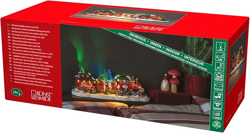 Besuche den Konstsmide-Store Konstsmide LED Szenerie Zug mit zwei Waggons und rotierendem Weihnachtsbaum, mit Musik, 19 bunte Dioden, 4, 5V Innentrafo, batteriebetrieben, schwarzes Kabel, Batterie: 3 x AA 1, 5V (exkl.) - 4235-000 — Weihnachtsbeleuchtung